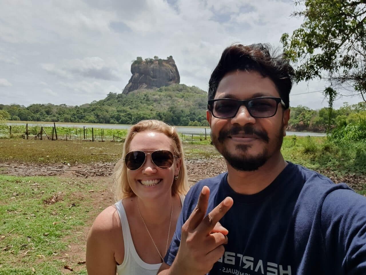 Our guide with a guest near Sigiriya